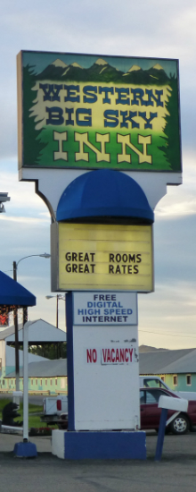 Sign Western Big Sky Inn